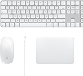 Vista de cima de uma secretária com o Magic Mouse, cabo USB‑C, Magic Trackpad e Magic Keyboard com teclado numérico