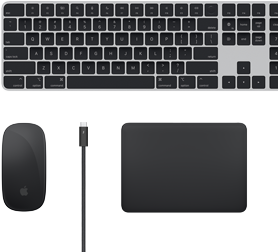 Vista superior dos acessórios Mac: Magic Keyboard, Magic Mouse, Magic Trackpad e cabo Thunderbolt.